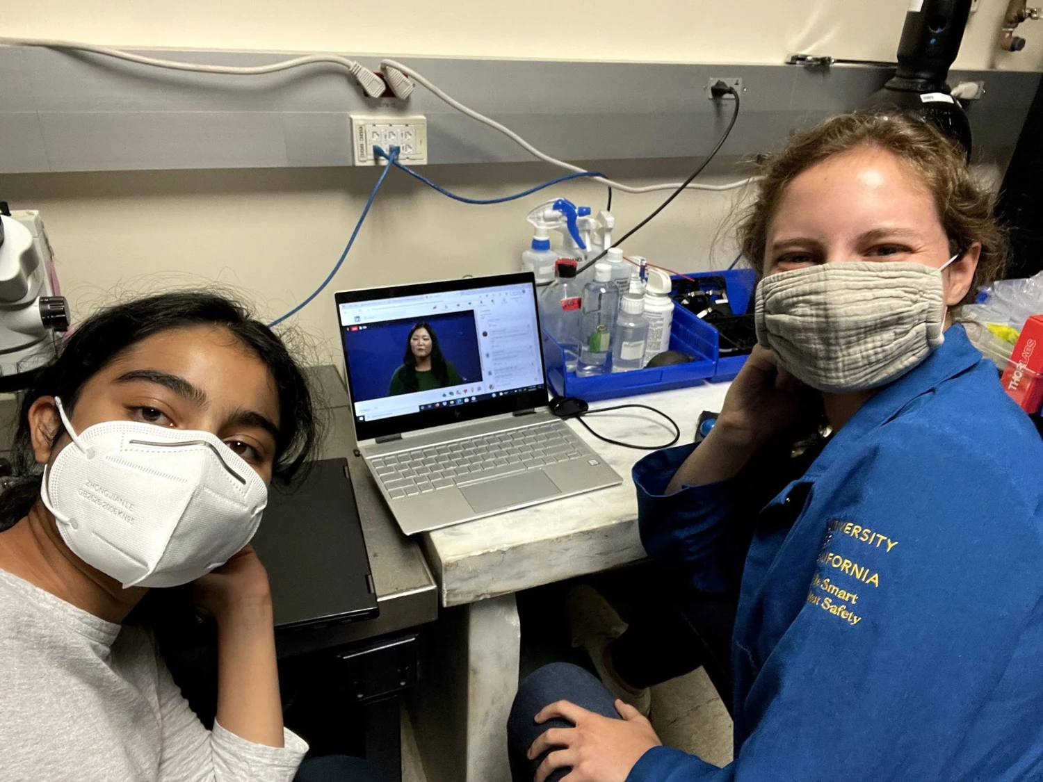 Ria Bahadur with a colleague at a neuroscience laboratory workbench