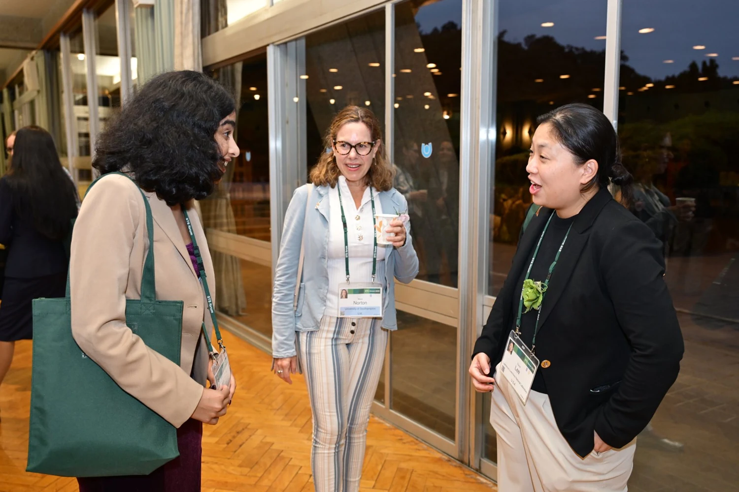 Ria Bahadur talking with fellow STS Forum participants